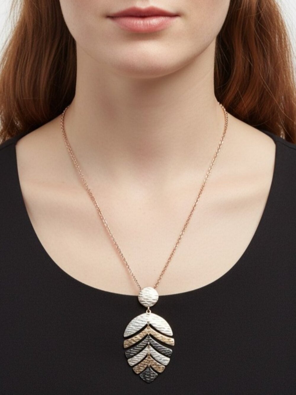 Liz Claiborne multi-gold colored stylized leaf necklace 30" chain.